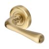 Heritage Brass Door Handle Lever Latch on Round Rose Charlbury Design Satin Brass finish