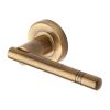 Heritage Brass Door Handle Lever Latch on Round Rose Alicia Design Antique Brass finish
