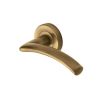 Heritage Brass Door Handle Lever Latch on Round Rose Centaur Design Antique Brass finish