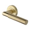 Heritage Brass Door Handle Lever Latch on Round Rose Bauhaus Mitre Knurled Design Satin Brass finish