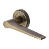 Heritage Brass Door Handle Lever on Rose Gio Design Antique Brass Finish