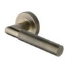 Heritage Brass Door Handle Lever Latch on Round Rose Bauhaus Mitre Knurled Design Antique Brass finish