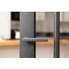 Millhouse Brass Stephenson Lever Door Handle on Concealed Round Rose - Matt Black