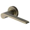 Heritage Brass Door Handle Lever Latch on Round Rose Julia Design Antique Brass finish