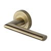 Heritage Brass Door Handle Lever Latch on Round Rose Admiralty Design Antique Brass finish