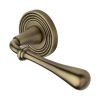 Heritage Brass Door Handle Lever Latch on Round Rose Roma Reeded Design Antique Brass finish
UK Registered Design Number 6226296