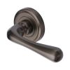 Heritage Brass Door Handle Lever Latch on Round Rose Charlbury Design Matt Bronze finish