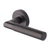 Heritage Brass Door Handle Lever Latch on Round Rose Bauhaus Mitre Knurled Design Matt Bronze finish