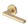 Heritage Brass Door Handle Lever Latch on Round Rose Trident Design Satin Brass finish