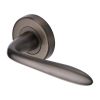 Heritage Brass Door Handle Lever Latch on Round Rose Sutton Design Matt Bronze finish