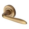 Heritage Brass Door Handle Lever Latch on Round Rose Sutton Design Antique Brass finish