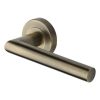 Heritage Brass Door Handle Lever Latch on Round Rose Athena Design Antique Brass finish