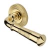 Heritage Brass Door Handle Lever Latch on Round Rose Bridgetown Reeded Design Polished Brass finish
UK Registered Design Number 6226297