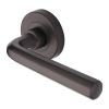 Heritage Brass Door Handle Lever Latch on Round Rose Octave Design Matt Bronze finish
UK Registered Design Number 6228267