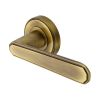 Heritage Brass Door Handle Lever Latch on Round Rose Century Design Antique Brass finish