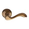 Heritage Brass Door Handle Lever Latch on Round Rose Lisboa Design Antique Brass finish